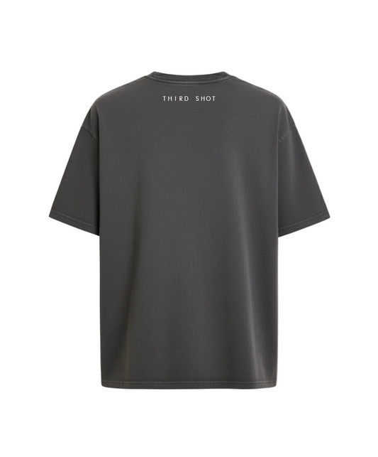 Black t-shirt with 'Third Shot' branding on the back against a light gray background