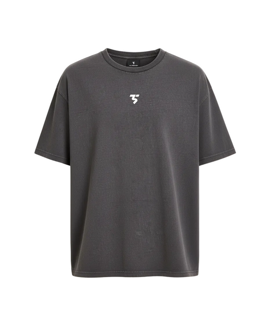 Gray t-shirt with a small logo on a light gray background